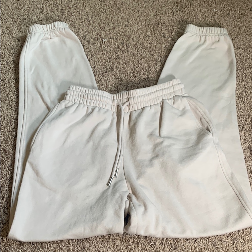 Cream Track Pants with Relaxed Fit and Sturdy Fabric
